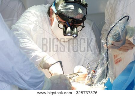 Masked Heart Surgeon Performs Open Heart Surgery