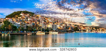 Greece landmarks - beautiful island Lesvos (Lesbos). Scenic Plomari (Plomarion) town over sunset