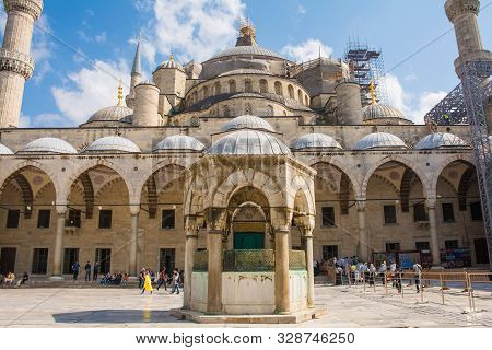 Istanbul, Turkey - September 5th 2019. Visitors Outside The Historic 17th Century Sultan Ahmet Mosqu