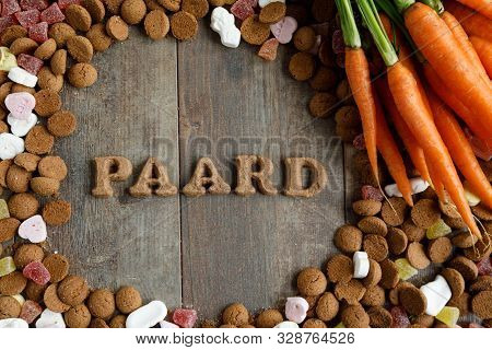 Dutch Candy Called Pepernoten Eaten During Sinterklaas Feast. Beside It Carrots To Be Given To The H