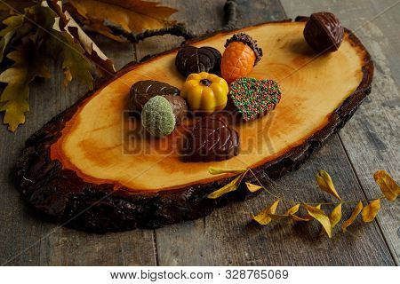 Autumn Chocolate Bonbon Decorated With Some Leaves