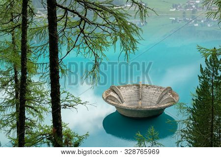 The Lake Vernagt-stausee (schnalstal, South Tyrol, Italy) On A Misty Morning In Summer. The Water Of
