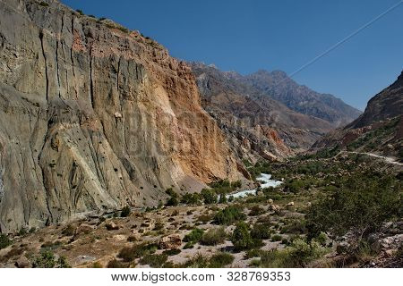 Tajikistan. The Pamir Highway. Panorama Of The Mountain River Iskanderdarya Flowing From Lake Iskand