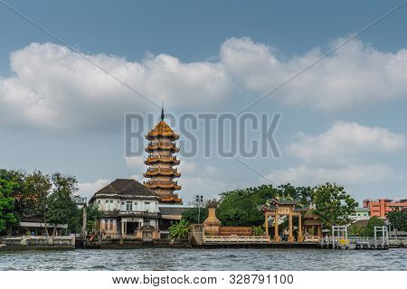 Bangkok City, Thailand - March 17, 2019: Wide View Chao Phraya River. Chee Chin Khor Temple And Red 