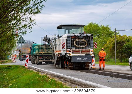 Valasske Mezirici, Czech Republic, 23 April 2019: Road Repair. Milling Machine Removes Old Asphalt F