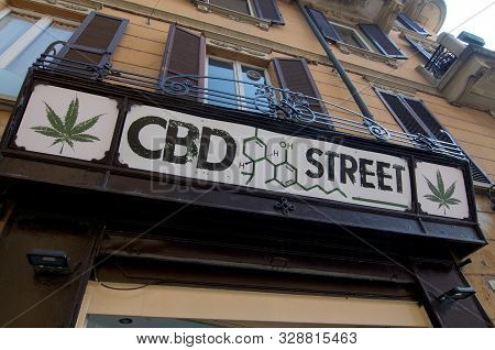 Pavia, Lombardy, Italy - 29th September 2019 : Low Angle View Of A Cbd Cannabis Store Sign Hanging O