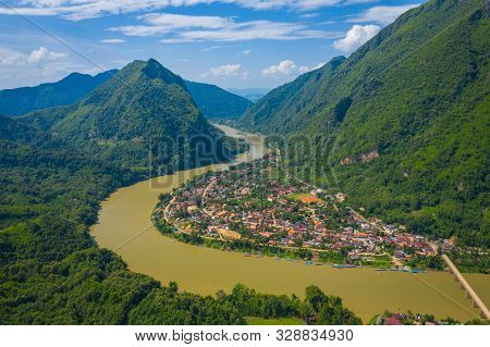Aerial View Of Village Of Nong Khiaw. North Laos. Southeast Asia. Photo Made By Drone From Above. Bi