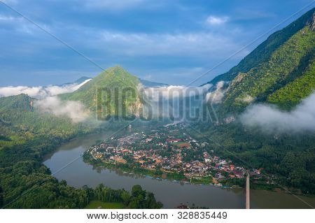 Aerial View Of Village Of Nong Khiaw. North Laos. Southeast Asia. Photo Made By Drone From Above. Bi