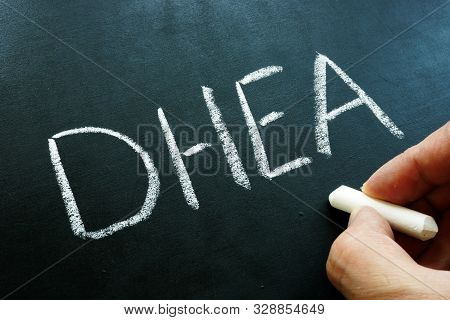 Dehydroepiandrosterone Dhea Hormone And Formula On The Blackboard.