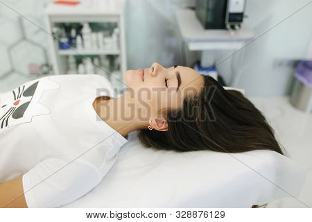 Young Girl At Cosmetic Beauty Spa Clinic Waiting For Beauty Procedure
