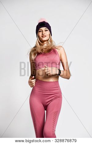 Beautiful Sexy Blonde Woman With Perfect Athletic Slim Figure By Physical Education Or Fitness, Lead
