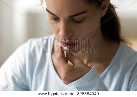 Millennial Lady Taking Vitamins Medicine, Antidepressant, Painkiller.