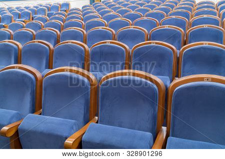 Blue Plush Chairs In The Auditorium Of The Theater. The Interiors Of The Concert Hall.