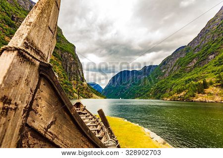 Old Viking Boat On Fjord Shore, Norway