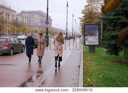 People On Moskovsky Prospekt Cloudy Autumn Day, October 2019 St. Petersburg, The Road With Cars