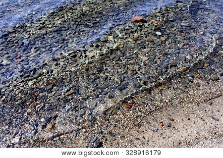 Clean Water In Lake Turgoyak On The Beach In Autumn, The Lake Is Also Called The Younger Brother Of 