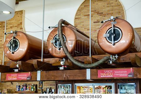 Valenciana, Spain - Oct 17 2019 : View Of Pressurised Beer Tanks High Up Above Bar In Roadside Cafe 