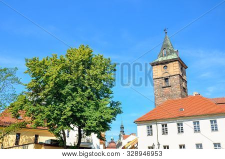 Historical Water Tower, Vodarenska Vez, In Pilsen, Czech Republic On A Sunny Day With Green Tree. Pl