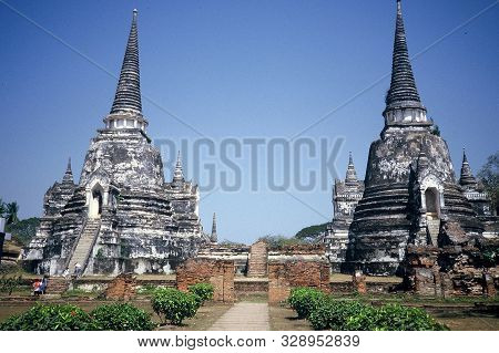 The Ancient Ruins Of Wat Phra Mahathat In Ayutthaya, Thailand.