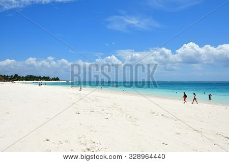 Kendwa, Tanzania - October 3, 2019: Beautiful White Sand Beach And Blue Transparent Water. Kendwa Re