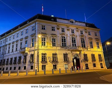 Austrian Chancellery By Night, Government Building At Ballhausplatz In Central Vienna