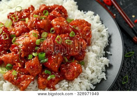 Tsos Chicken With Rice, Green Onion And Broccoli