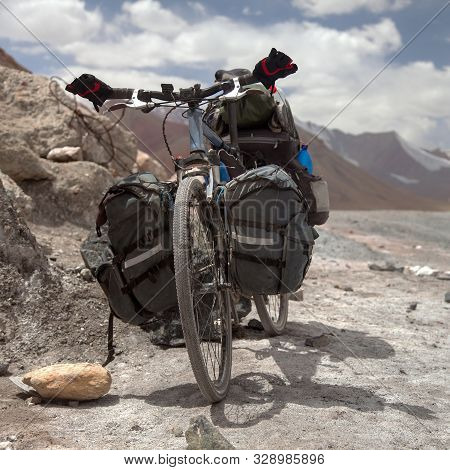 Bike In Ak-baytal Pass, Long Distance Cycling On M41 Pamir Highway, Pamir Mountain Range, Tajikistan