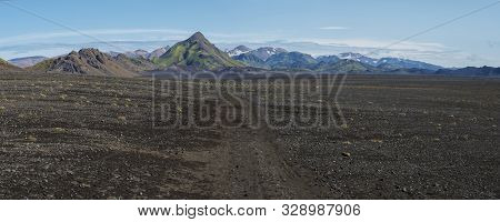 Wide Panoramic Volcanic Lava Desert Landscape With Green Storasula Mountain Peak, Landmannalaugar Mo