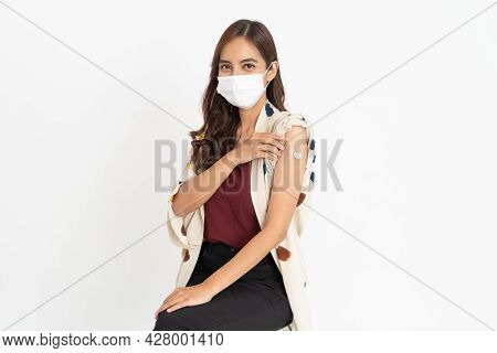 Asian Patient Getting Vaccinated Against Coronavirus By Doctor