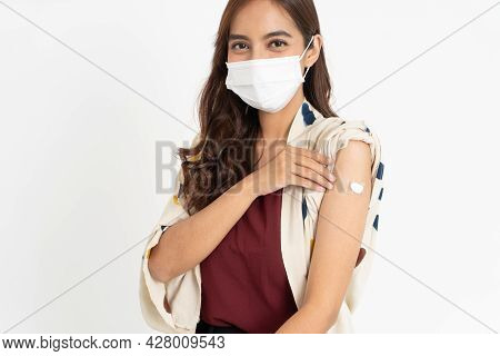 Asian Patient Getting Vaccinated Against Coronavirus By Doctor