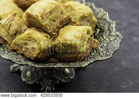 Tasty Sweet Baklava. Turkish Ramadan Dessert Baklava On A Decorative Plate. Baklava With Nuts And Ho
