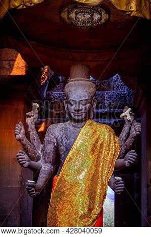 Ancient God Vishnu Statue At Angkor Wat, Siem Reap, Cambodia. Vishnu Is A Hindu God