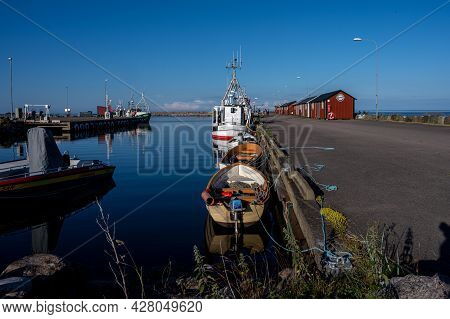 June 26, 2021 - Boda Harbour: Small Fishing Boats In Beautiful Sunset Light. These Fine Days Have Br