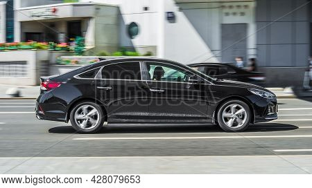 Moscow, Russia - July 2021: Black Hyundai Sonata Seventh Generation, Side View. Photography Of A Mod