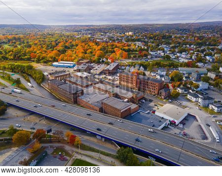 Worcester Knitting Company building and landscape aerial view with fall foliage in city of Worcester, Massachusetts MA, USA.