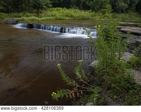 Prairie Creek Flows Over One Of The Few Natural Waterfalls In Will County, Illinois And Is Framed By