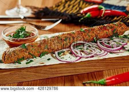 Lamb Kebab With Thin Lavash, Fresh Onion And Satsebeli Sauce