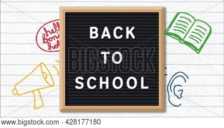 Image of words Back to School on black letter board with multiple school items moving on white lined paper in background. Education back to school and schooling concept digitally generated image.