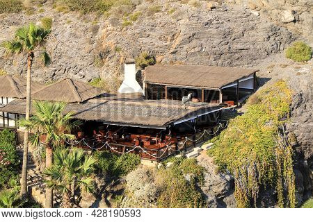 Beautiful Restaurant At Cala Del Barco Cove In Atamaria, Cartagena Province, Spain On A Sunny Day Of