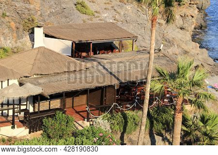 Beautiful Restaurant At Cala Del Barco Cove In Atamaria, Cartagena Province, Spain On A Sunny Day Of