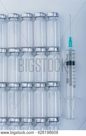 Medicine, Injection, Vaccine And Disposable Syringe, Drug Concept. Sterile Vial Medical Syringe Need