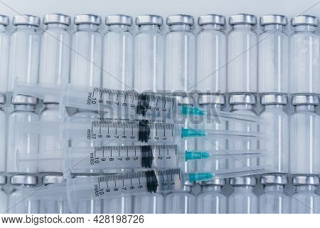 Medicine, Injection, Vaccine And Disposable Syringe, Drug Concept. Sterile Vial Medical Syringe Need