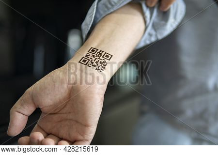The Man Shows His Hand With A Qr Code, A Confirmation Of The Vaccination Against The Covid 19 Corona