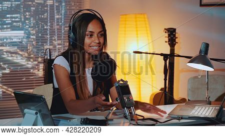 Close-up Of Female Radio News Reporter Recording Her Morning Speech In Home Studio, Working In The E