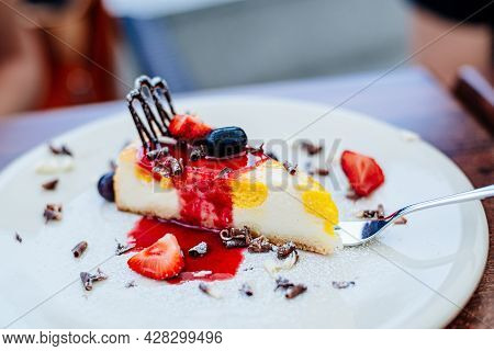 Cheesecake With Peaches, Raspberry Mousse With Pieces Of Fruit.