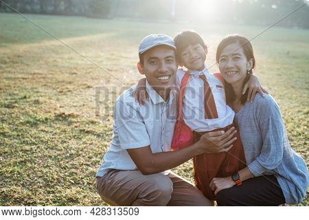 Family Asian With Their Primary School Student Kid