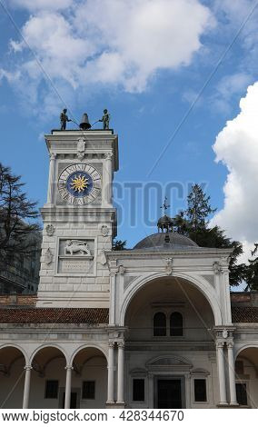 Ancient Bell Tower In The Main Square Of The City Of Udine Called Piazza Liberta In Northern Italy