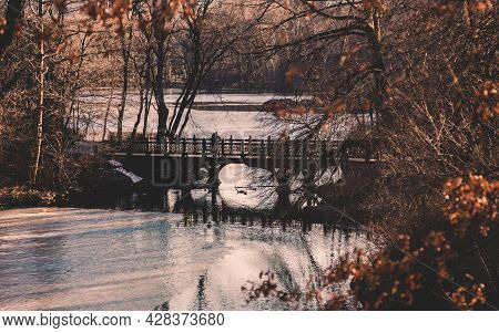 Beautiful Fall Colors At Oak Bridge , Bank Rock Bay, Central Park, New York City.