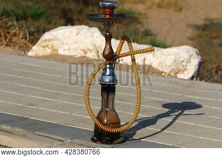 Oriental Smoking Pipe Nargila - Hookah. Hookah In A City Park In Israel.