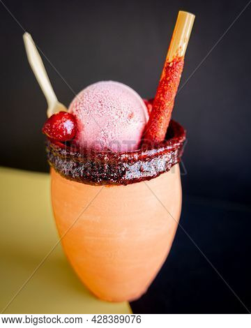 Delicious Cantarito With Tequila, Strawberry Snow, Chili Powder And Traditional Mexican Candy, With 